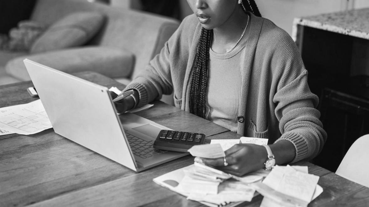 Investment planning session with detailed financial analysis and portfolio review materials